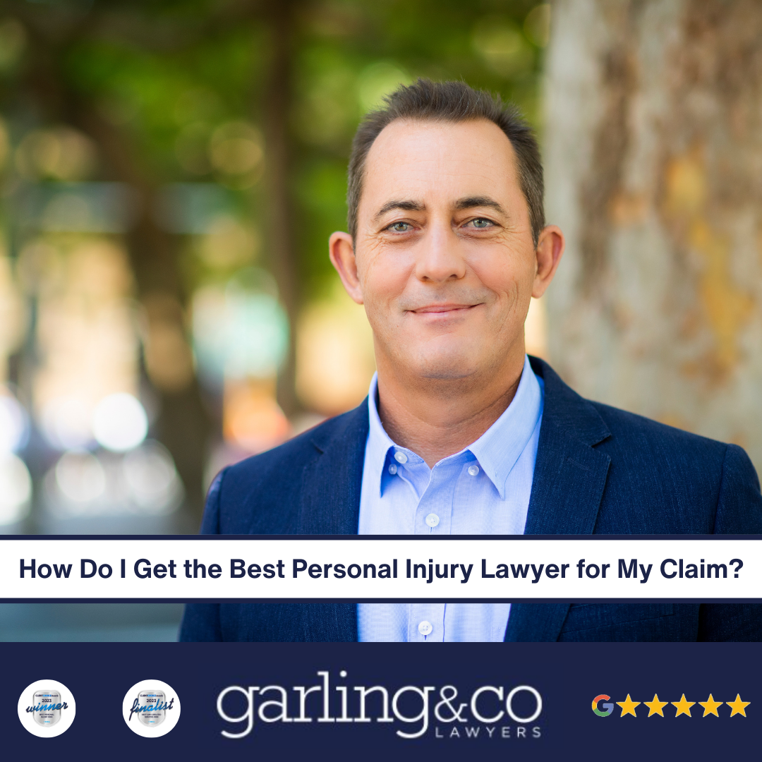 A man with a smile in front of a tree in a shirt and suit jacket with the caption “How Do I Get the Best Personal Injury Lawyer for My Claim”